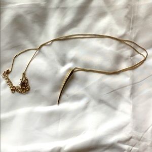 Long gold necklace